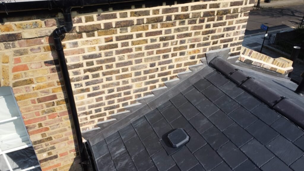 New natural slate roof being laid, London