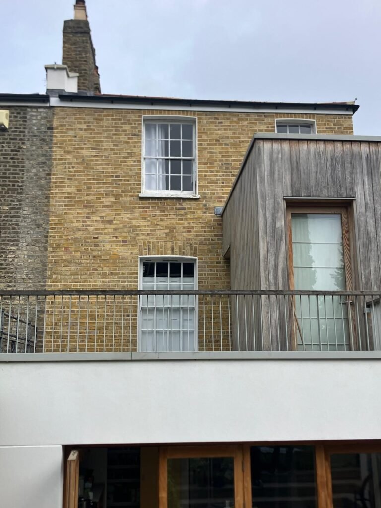 Brickwork restoration and lime repointing in progress, London