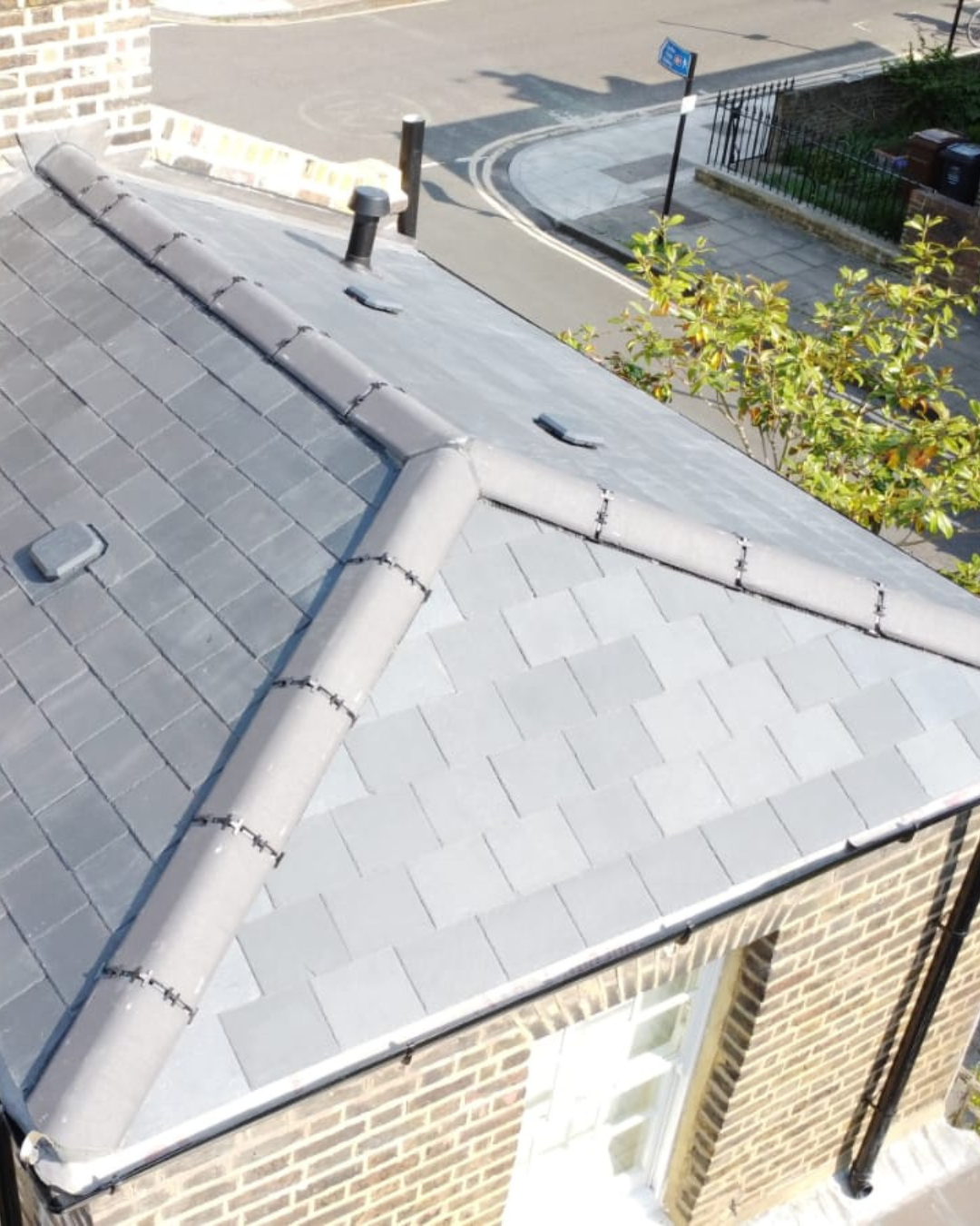 Roof replacement with natural slate on a Hackney E8 terrace by BARL